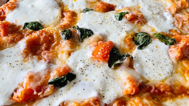 Classic Margherita pizza with fresh basil